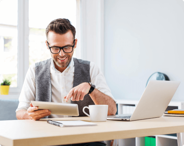 man working and looking at data